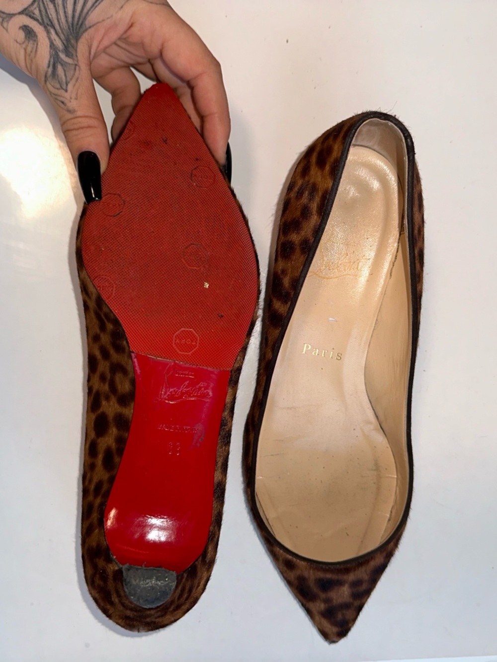 Louboutin leopard print low cut kitten heels